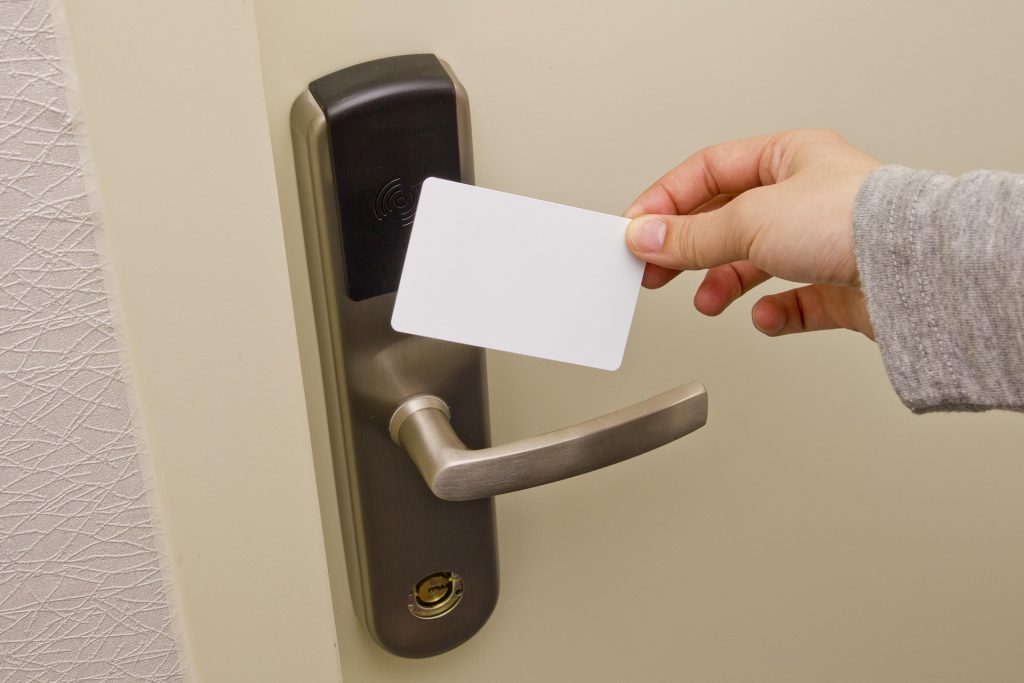 access card tapping on door